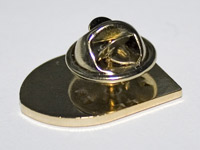 Back of a Pin Badge, showing the safety fastener over the pin