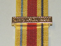 Illustration of a miniature medal bar on a ribbon